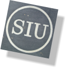 close up of silk screened logo on hand painted sign